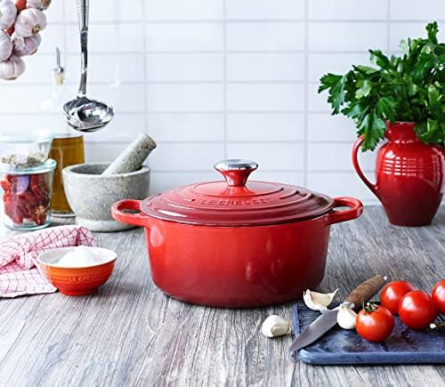 Cerise red round enameled cast iron dutch oven — photo 5
